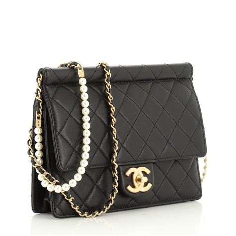 black chanel pearl bag|Chanel small quilted bag.